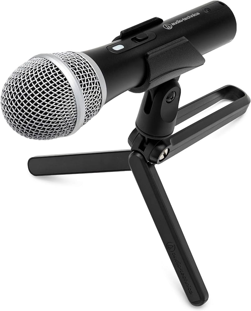 image of the Audio Technica ATR2100x-USB Microphone on a small mic stand