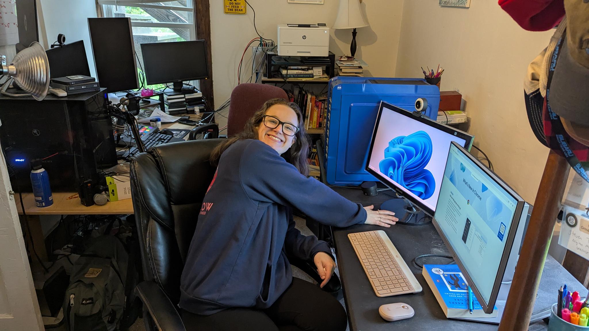 Photo of Michelle smiling near her 'new' computer