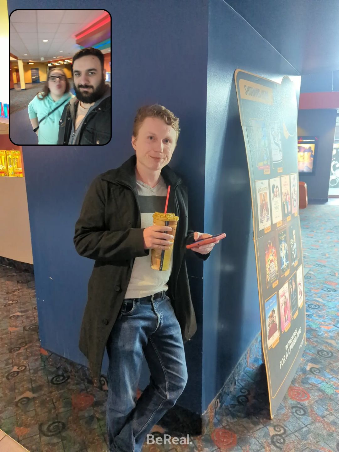 photo of a man leaning up against a pillar in a movie theater. In the top left there is also a photo of a man and woman taking a selfie. The photo has the word BeReal at the bottom.