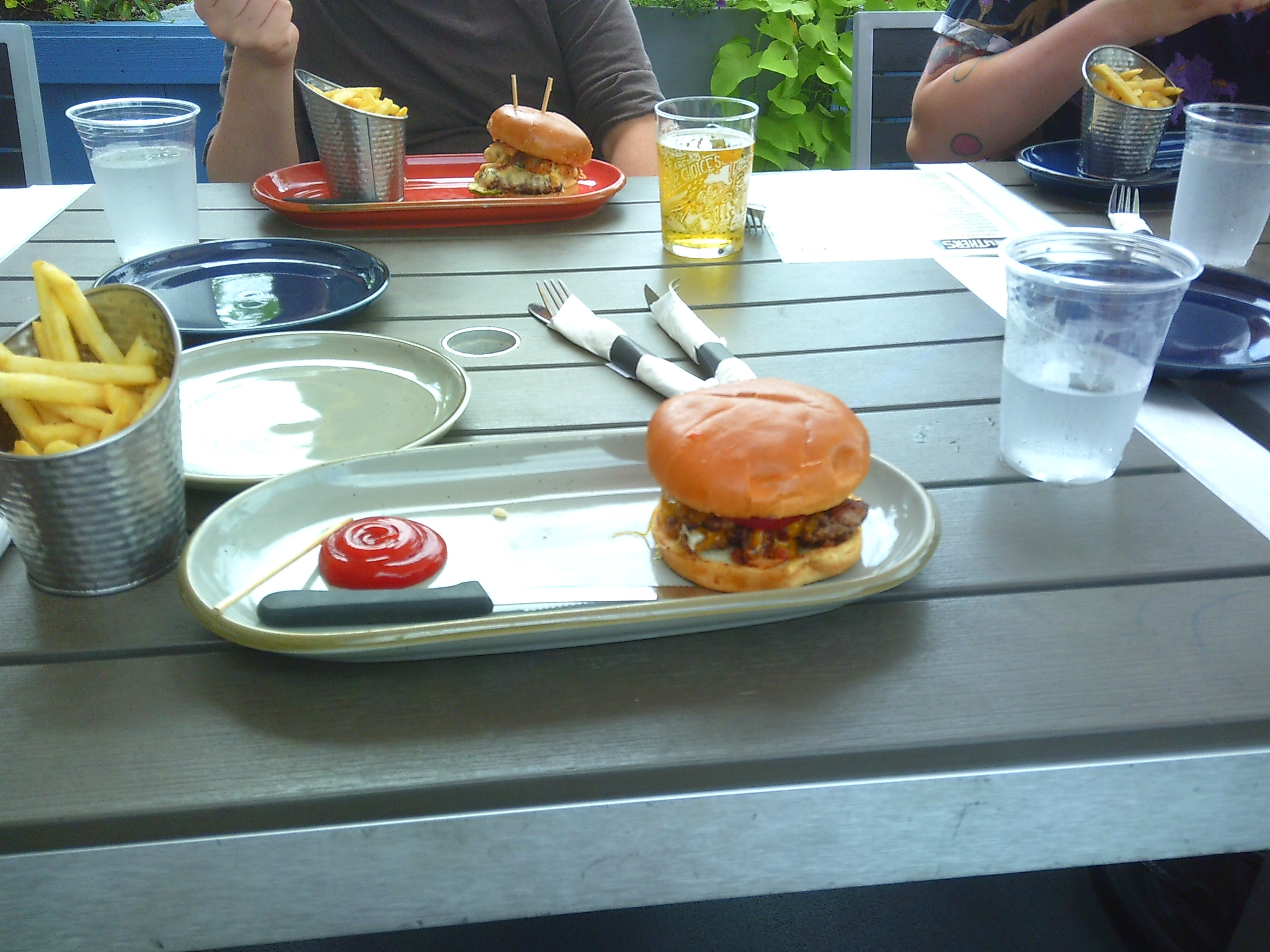 photo of a hamburger and fries