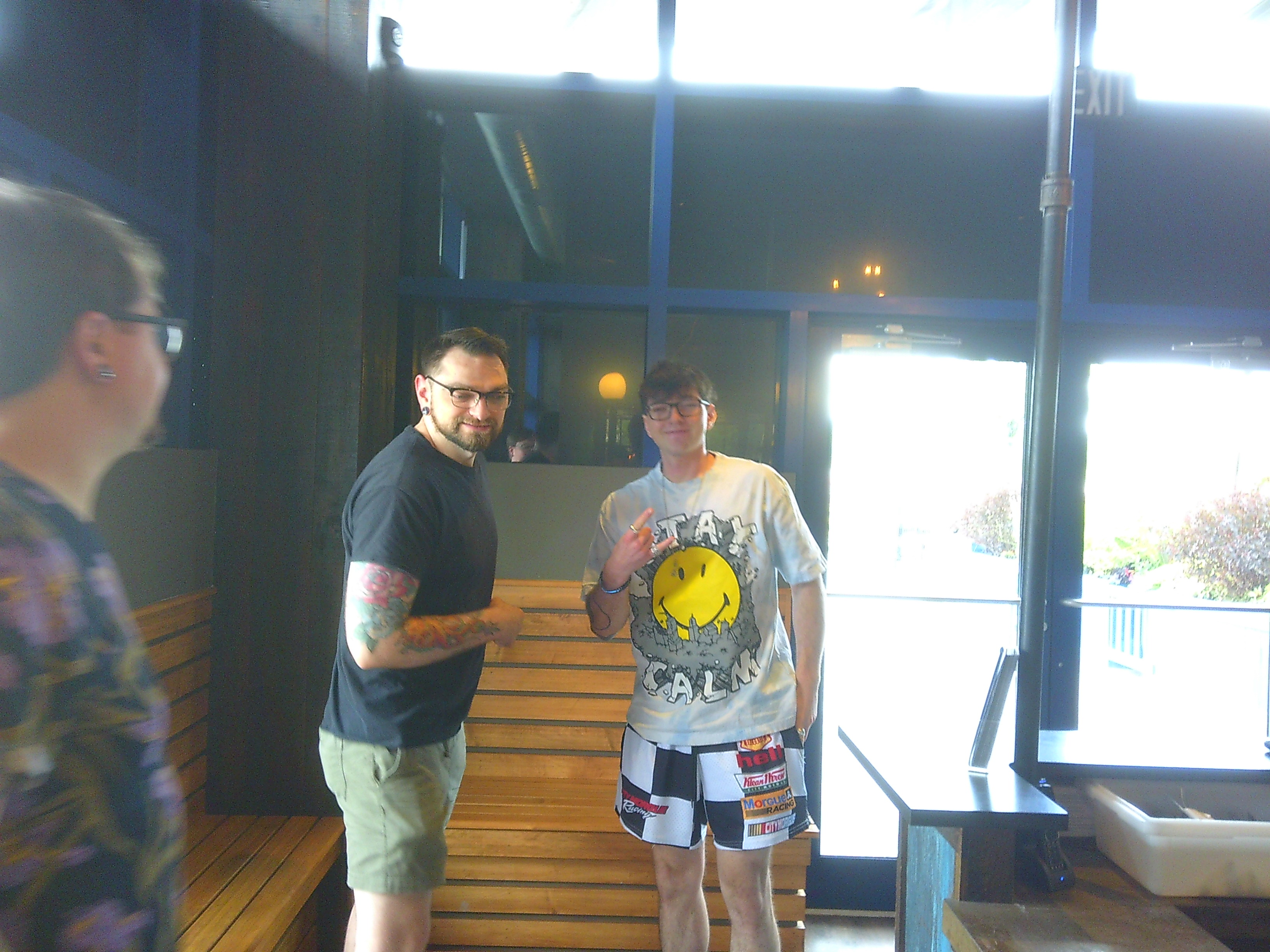 photo of two brothers looking excited in the lobby of the Druthers restaurant