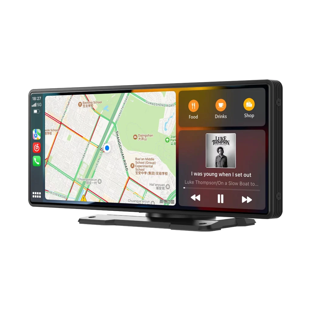 image of the coral vision rx10. It's showing off apple car play which has a map open as well as a song playing. It's a rectangular screenthat is more long than tall